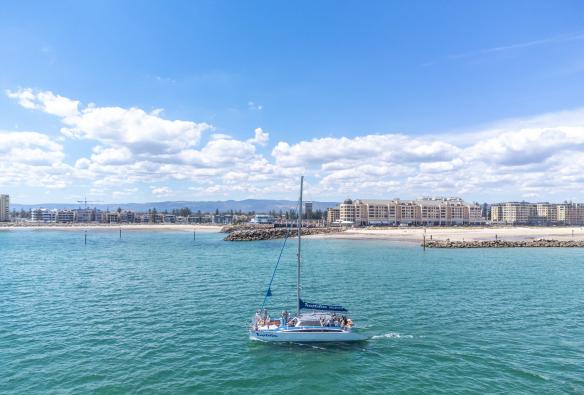 Aerial view over a sail boat, Temptation Sailing, Adelaide, South Australia © Tourism Australia