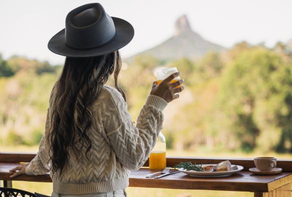 Woman looking out to farm, Seven Peaks Farm Stay, Sunshine Coast, Queensland © Seven Peaks Farm Stay