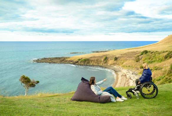 A person in a wheelchair admiring the coast at The Cove, North West Tasmania, Tasmania © Tourism Australia