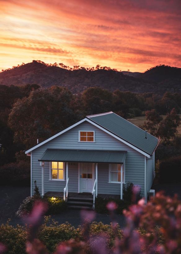 Sun setting over accommodation at Nimbo Fork Lodge, Killimicat, New South Wales © Destination NSW