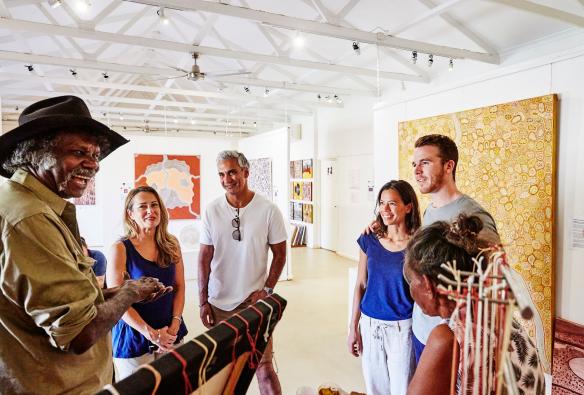 Visitors admire Indigenous artworks with an Aboriginal guide at Waringarri Aboriginal Arts Centre, Kununurra, Western Australia © Tourism Western Australia