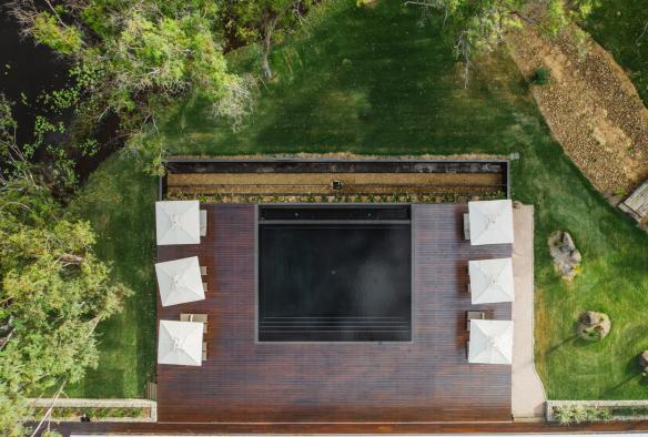 Aerial of the swimming pool and surrounding deck and greenery at Mt Mulligan Lodge, Mt Mulligan, Queensland © Tourism Australia