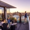 Aster Bar rooftop bar overlooking Harbour Bridge and Opera House, Sydney, New South Wales © Tourism Australia