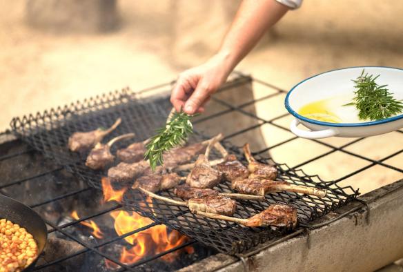 Meat cooking on a barbecue, Limestone Coast, South Australia © Tourism Australia