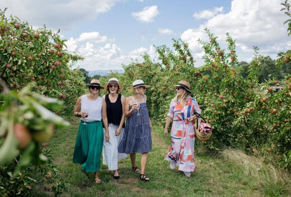 Group of women walking the grounds at Printhie Wines, Orange, New South Wales © Kirsten Cunningham