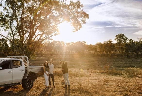 Couple being shown the grounds of Wilga Station by a guide, Bathurst, New South Wales © Tourism Australia