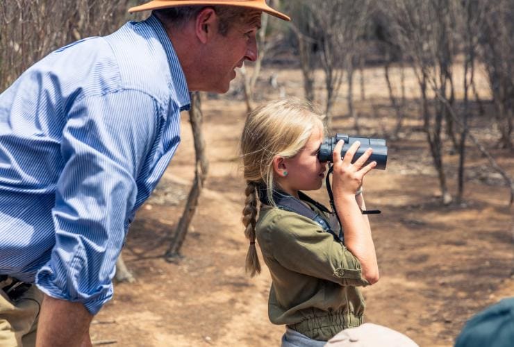 A tour guide and a child looking through binoculars, Exceptional Kangaroo Island, Kangaroo Island, South Australia © Exceptional Kangaroo Island