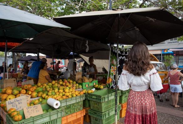 Woman walking around the Parap Markets, Darwin, Northern Territory © Tourism Australia