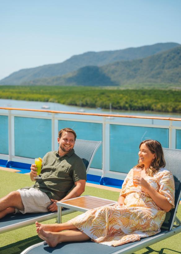 Couple onboard the Coral Princess Cruise ship in Cairns Harbour, Queensland © Tourism and Events Queensland