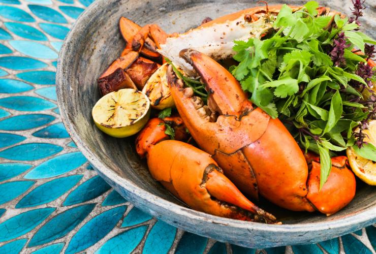 Wok fried mud crab on a plate, Nu Nu Restaurant, Palm Cove, Queensland © Sara Oliveira/Nu Nu Restaurant