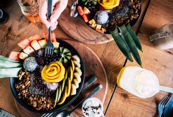 Aerial view of a bowl of fresh fruit and granola at Windmill Cafe, Bargara, Queensland © Tourism and Events Queensland