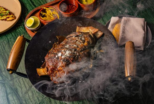 A steaming dish of lamb at Osborn House, Southern Highlands, New South Wales​ © Osborn House