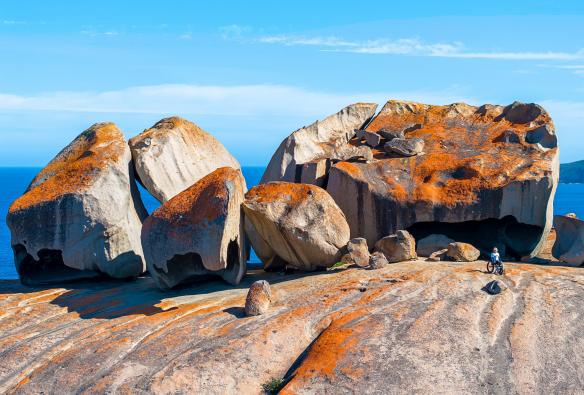 Two people gaze at the Remarkable Rocks, Kangaroo Island, South Australia © Tourism Australia