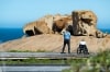 Two people gaze at the Remarkable Rocks, Kangaroo Island, South Australia © Tourism Australia