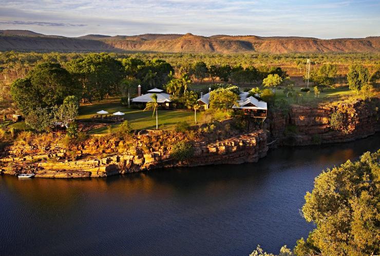 Aerial view over lodges on top of a cliff leading to a gorge at El Questro Homestead, Chamberlain River, Kununurra, Western Australia © Tourism Western Australia 