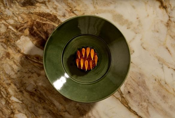 Aerial view over a carefully plated dish on a marble table at LVN, Bird in Hand, Adelaide Hills, South Australia © Bird in Hand