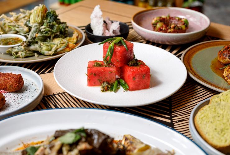 Plated dishes at Big Esso by Mabu Mabu, Melbourne, Victoria © Big Esso 