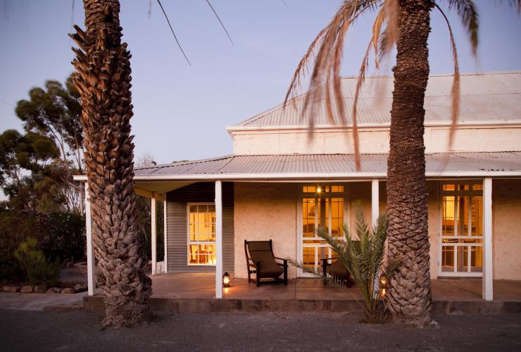 Homestead exterior with lights on at dusk at Arkaba Conservancy, Flinders Ranges, South Australia © Arkaba Conservancy/Randy Larcombe