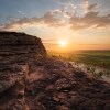 Man standing on the top of the rock in Ubirr, Kakadu National Park © Tourism NT/Daniel Tran9