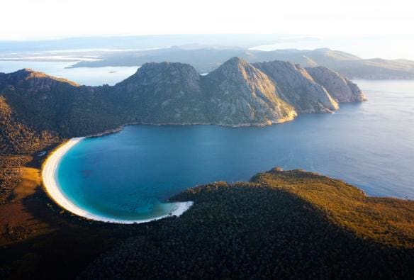 Aerial view over Wineglass Bay in Freycinet National Park, Tasmania © Lauren Bath 
