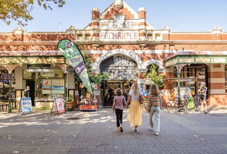 A family walks toward the ornate entrance into the Fremantle Markets, Perth, Western Australia © Tourism Australia